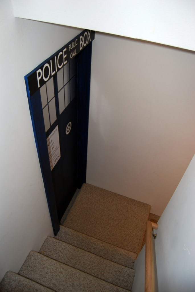 TARDIS door at the bottom of basement stairs