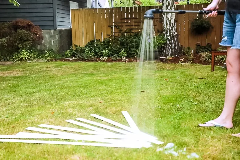 rinsing off slats before painting blinds