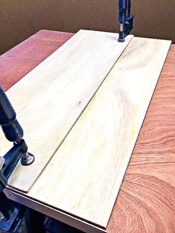 Clamp the two pieces of the circular saw jig together and let glue dry