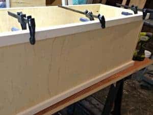 clamp the top trim to hold it in place