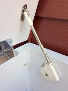 holes from multiple attempts at installing the soft close lid support in my storage bench