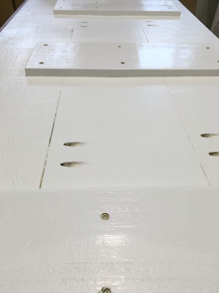 underside of storage bench lid painted