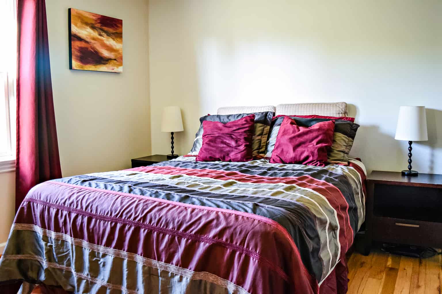 burgundy red and tan bedroom