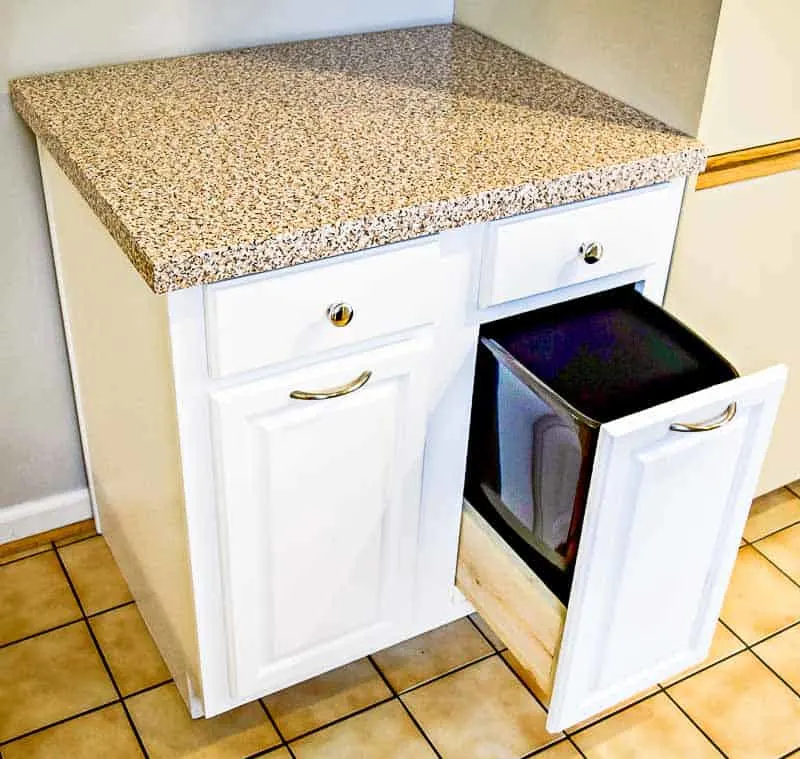 kitchen cabinet with pull out trash drawer