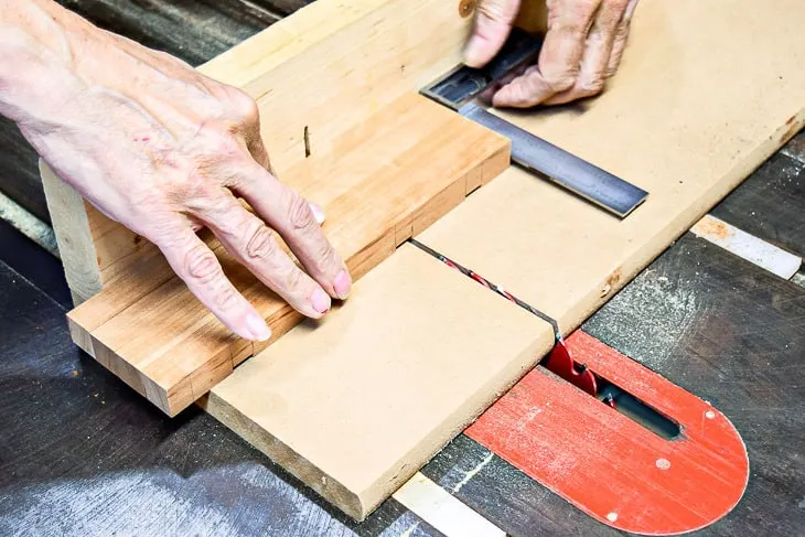 cutting notches on a table saw for a DIY wall sconce