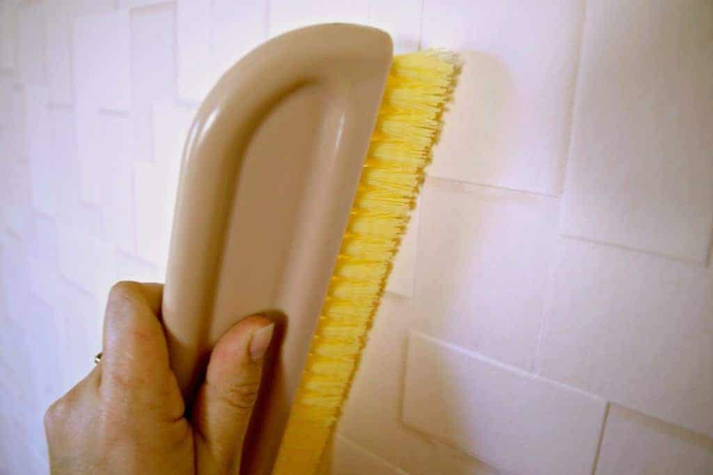 Move the wallpaper smoothing brush around in all directions to avoid stretching the textured wallpaper - The Handyman's Daughter