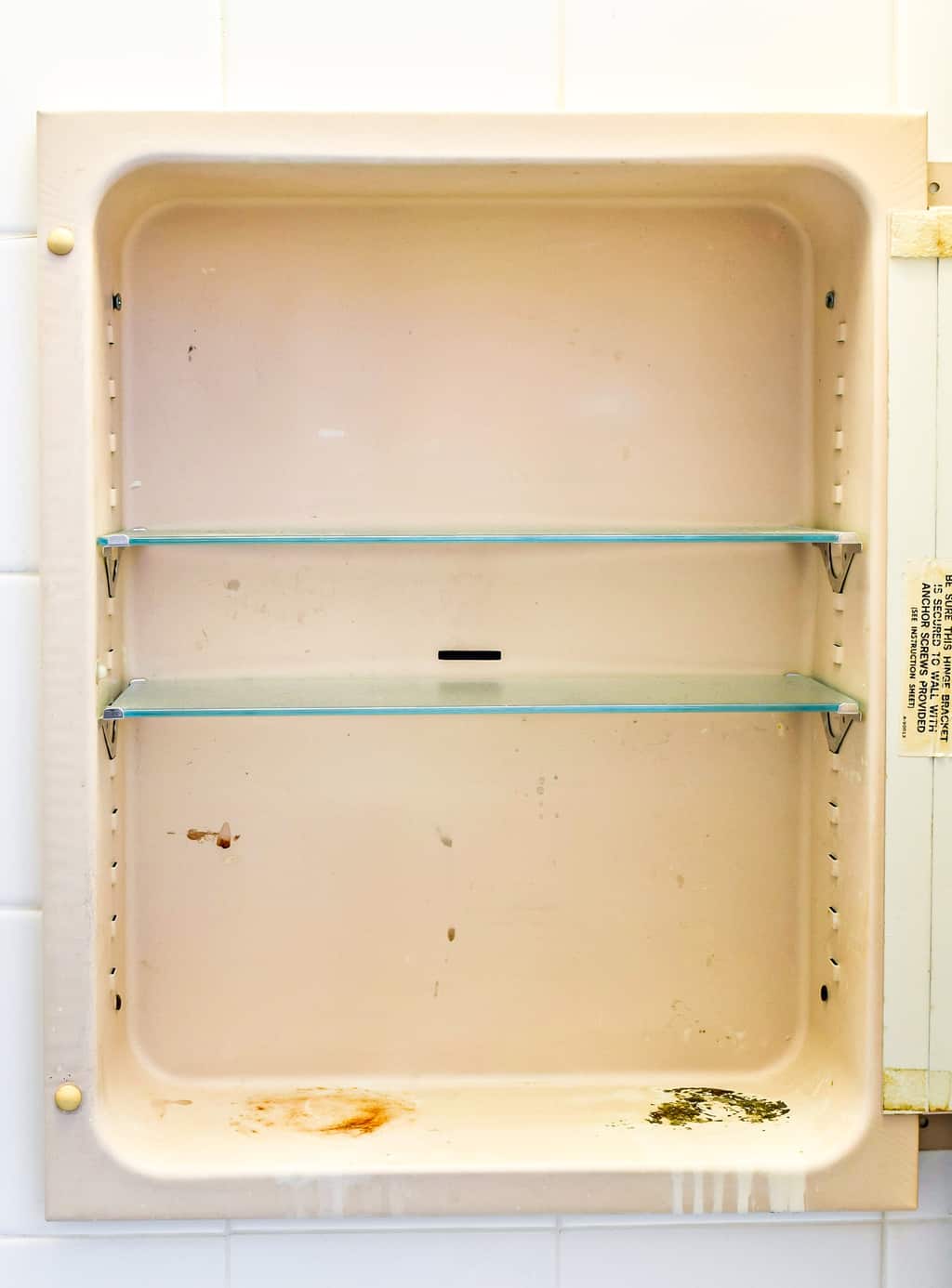 old, rusty metal medicine cabinet