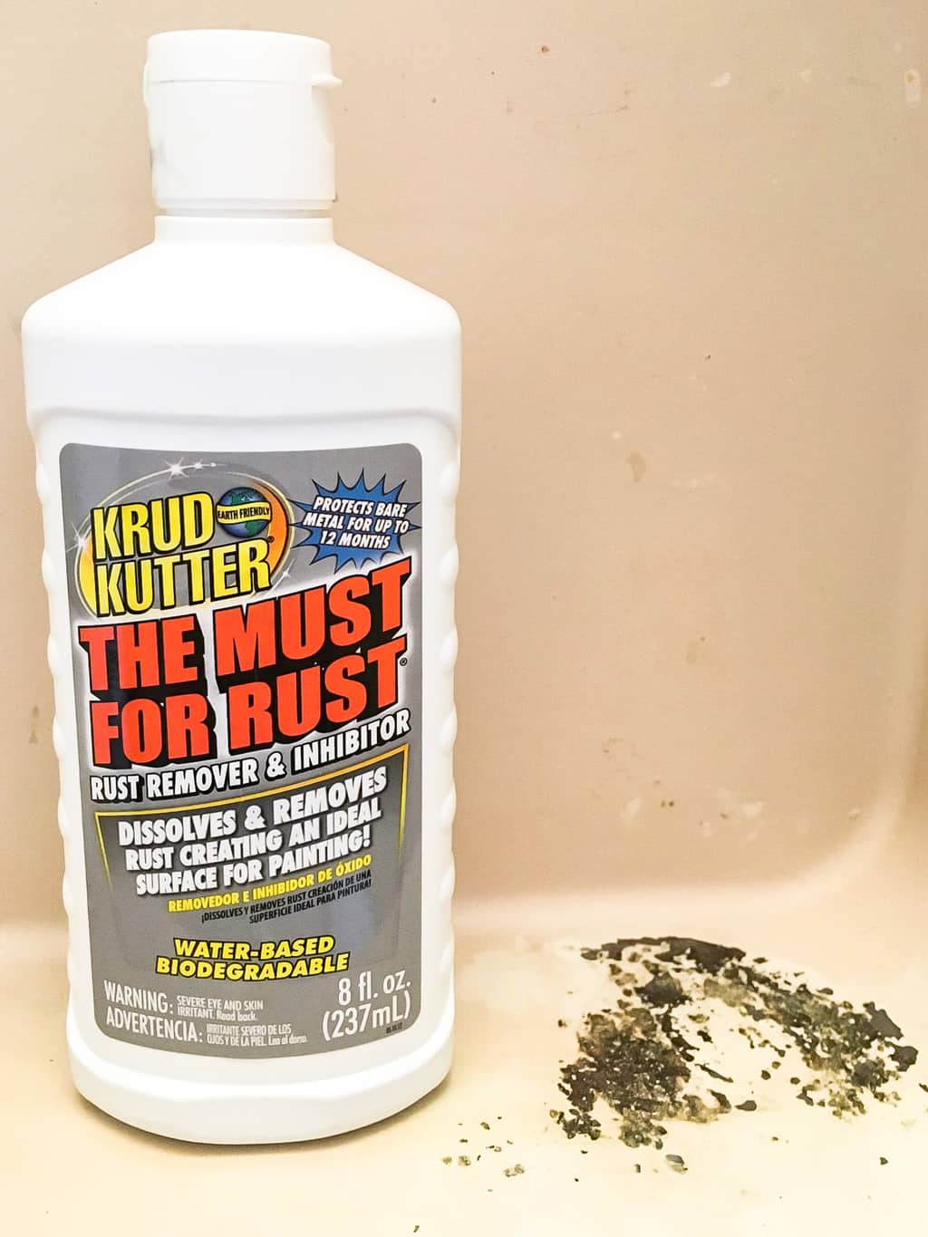 bottle of Krud Kutter inside metal medicine cabinet