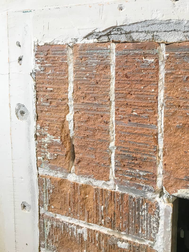 damage to drywall around fireplace surround
