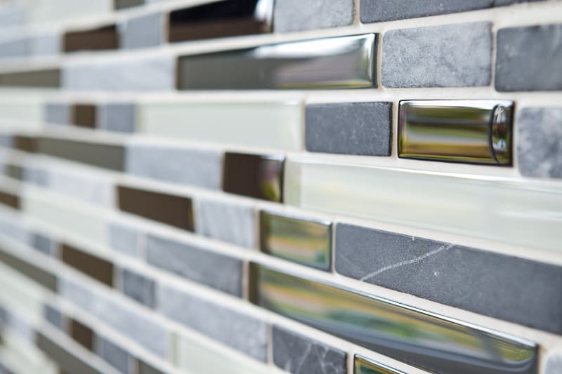 stone and glass fireplace tile