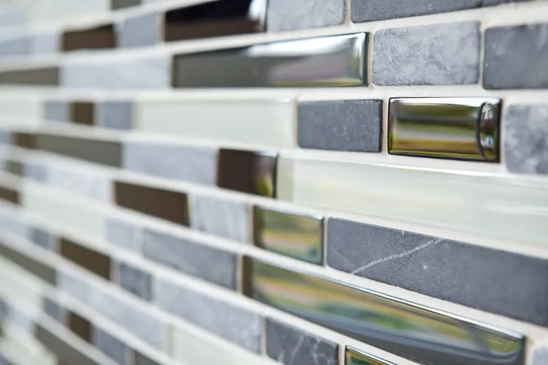 stone and glass fireplace tile