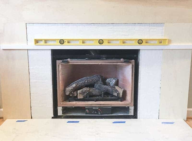 How I Installed My Fireplace Tile The Handyman S Daughter Add A Level Board To The Top Edge Of Firebox So Fireplace Tile Doesn