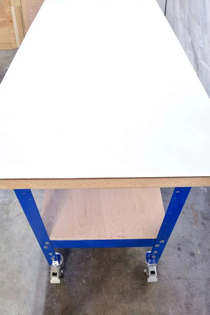side view of Kreg workbench with white laminated top