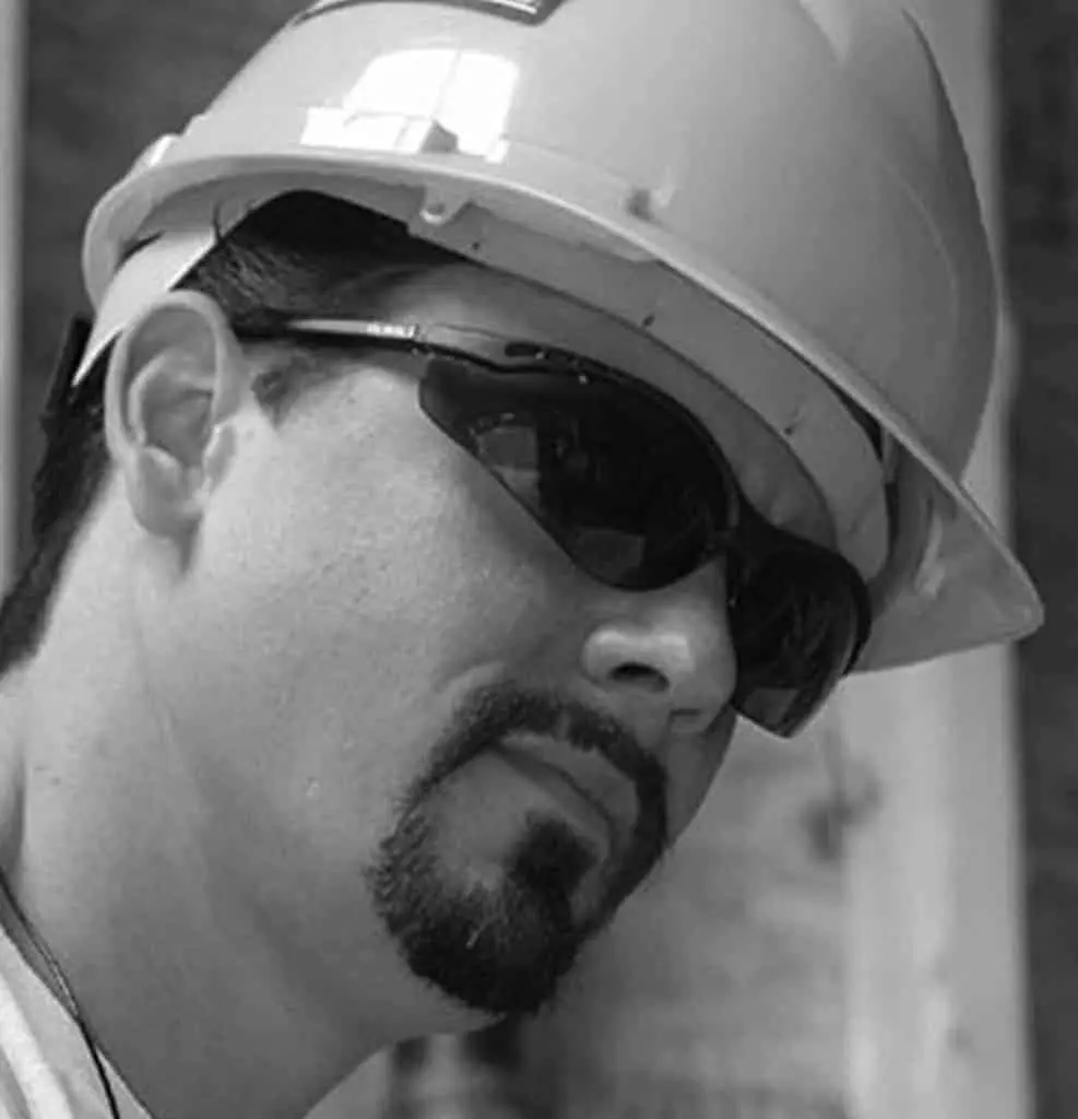 man wearing a hard hat and Dewalt bifocal safety glasses