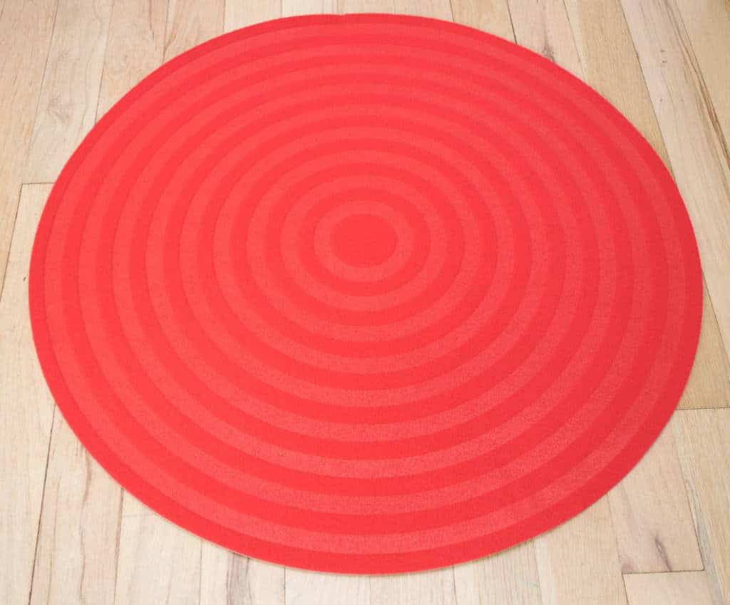 red circular area rug to be painted