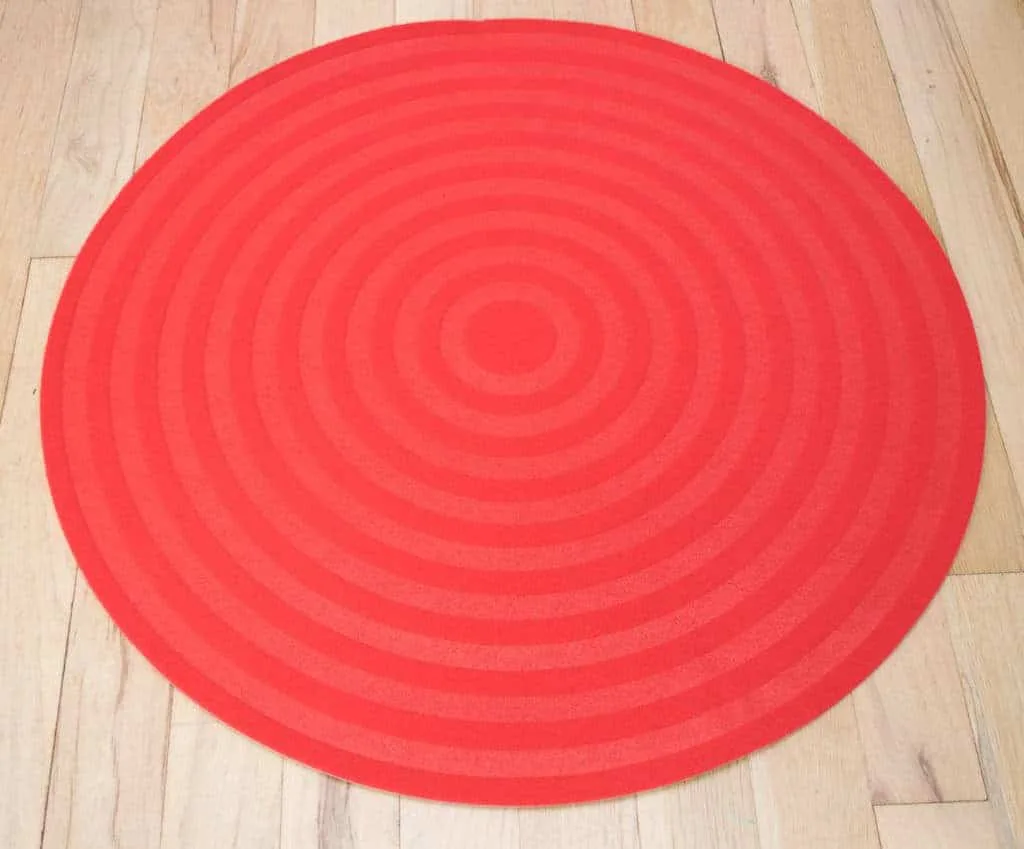 red circular area rug