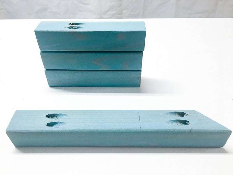 blue stained 2x2 boards with pocket holes