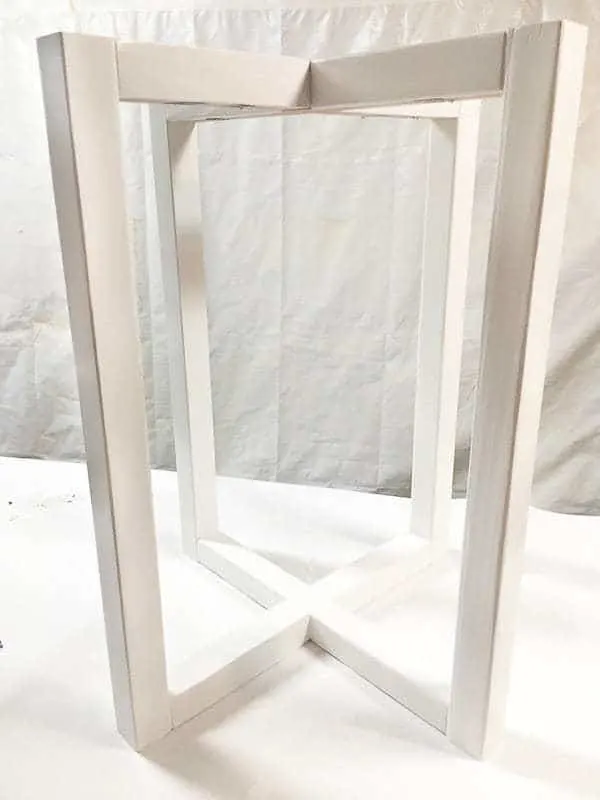 X shaped side table base painted white