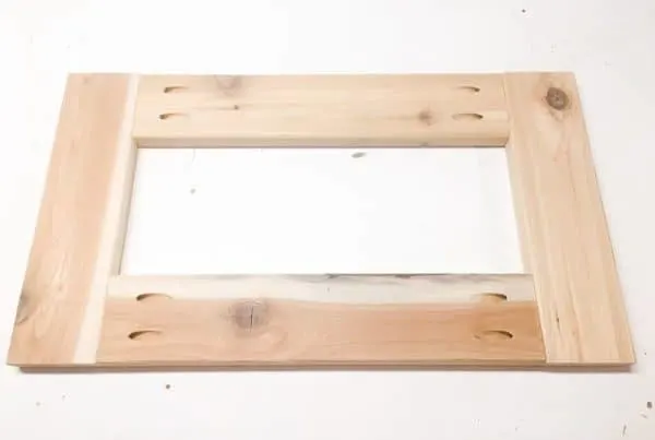 four cedar boards joined together in a rectangle with pocket hole screws