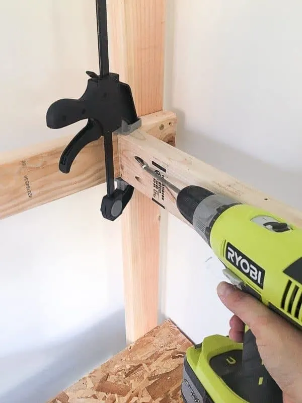 attaching cross supports on shed shelving unit