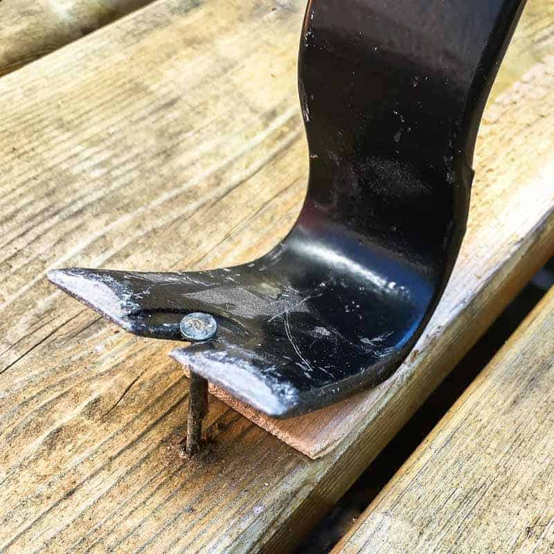 removing popped nail from deck