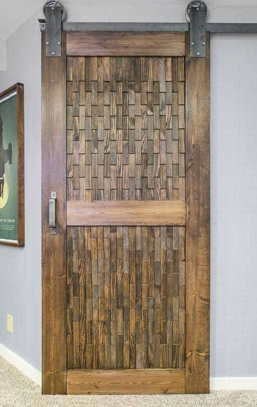 The wood shim texture on this sliding barn door is just amazing!