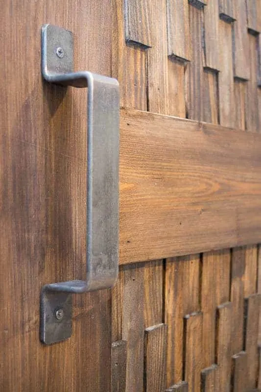 large metal handle on barn door