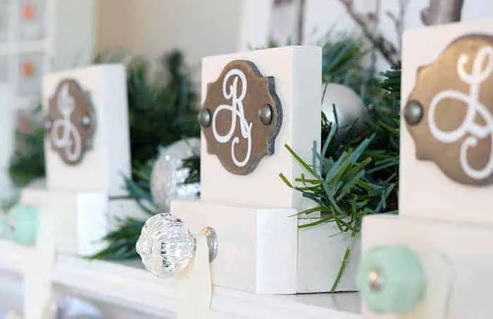 monogrammed stocking holders with glass knob hooks