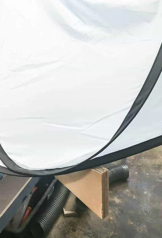 dust hood on top of angled plywood pieces