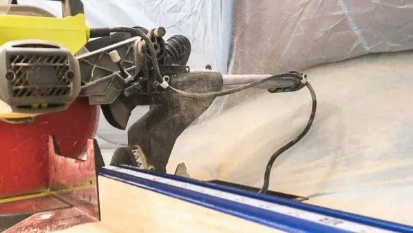 sawdust shooting into the miter saw dust hood