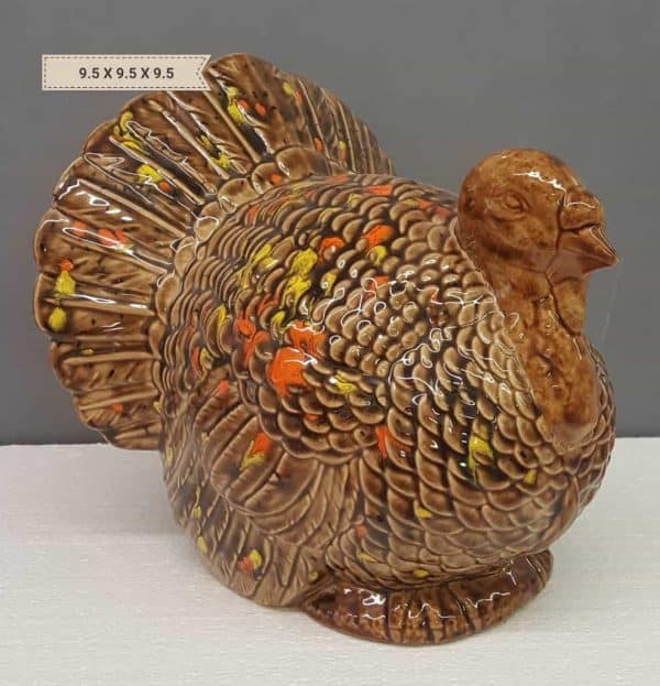 This hand glazed ceramic turkey will be the star of your Thanksgiving dinner table!