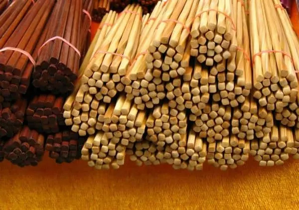numerous bundles of wooden chopsticks