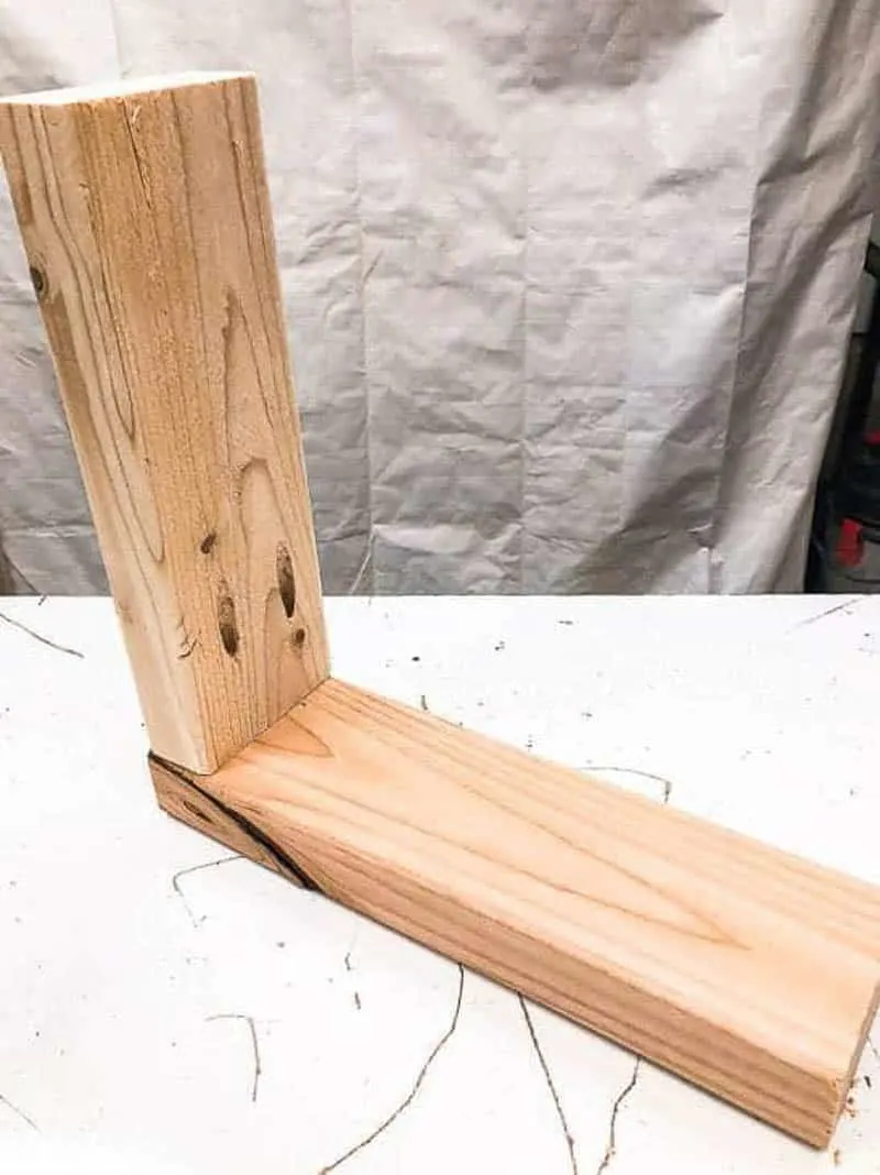 Bracket for garden tool storage rack made from wood