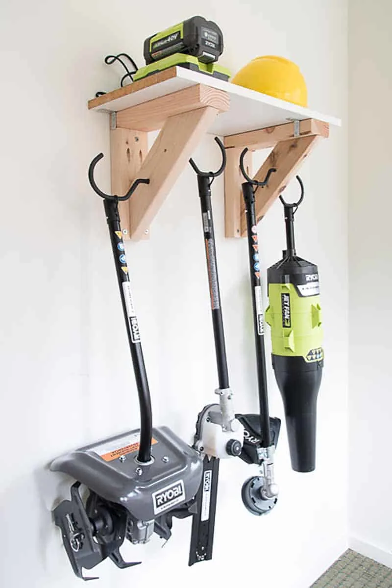 side view of garden tool storage rack with tools