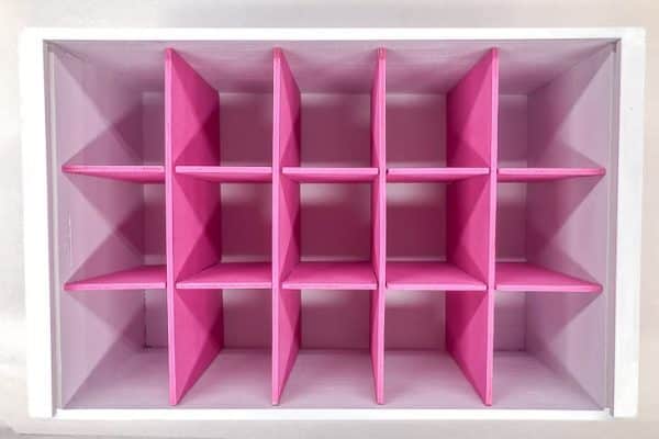 white box with pink box dividers arranged in a grid