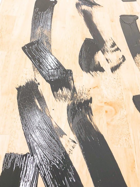blobs of grey wood stain on wood