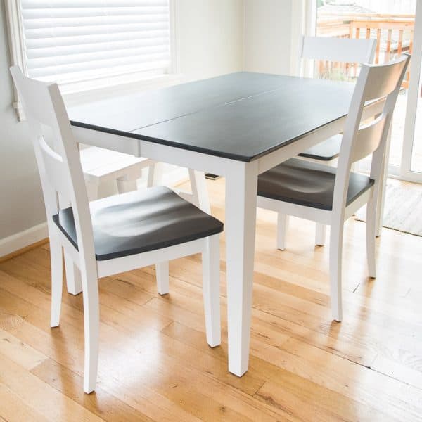dining table with grey wood stained top and white legs