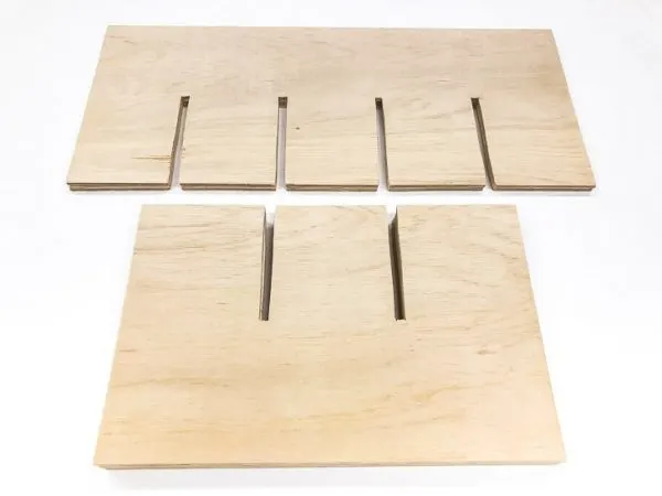 plywood pieces with ¼" notches cut halfway through