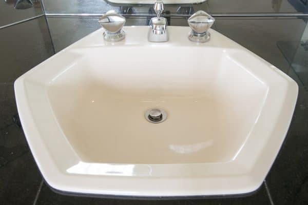 almond colored hexagon bathroom sink