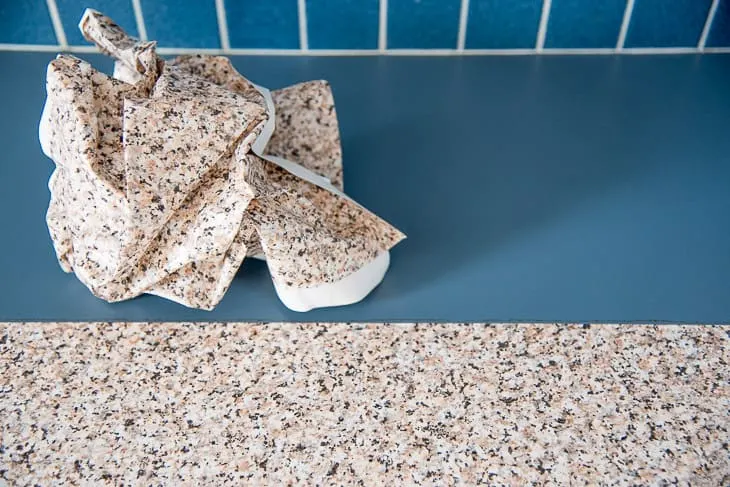 contact paper kitchen counter with half peeled away to show no residue