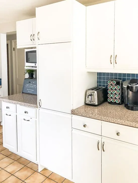 melamine cabinets with oak trim painted white