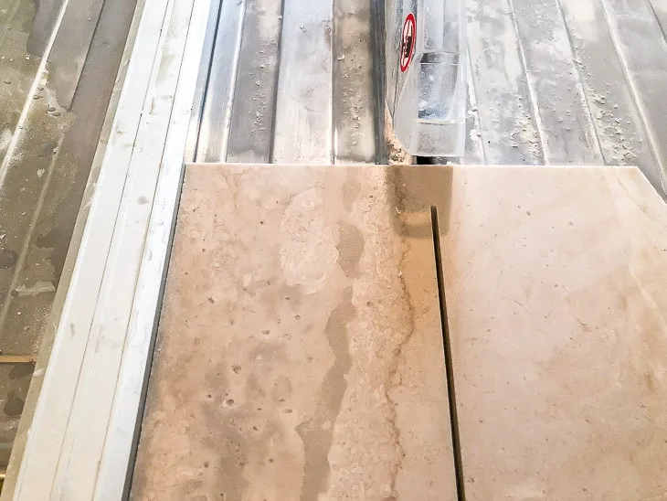 cutting limestone tile on a tile saw