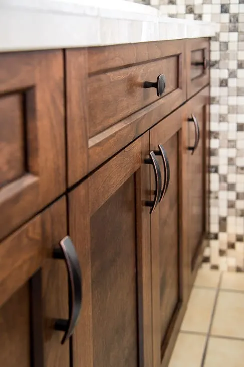 New cabinet doors on bathroom vanity with new hardware