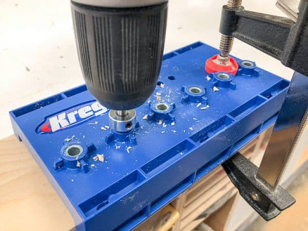 Drilling holes in recessed bathroom shelves for shelf pins