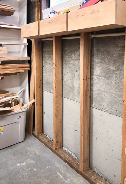 exposed studs for between the studs storage shelves