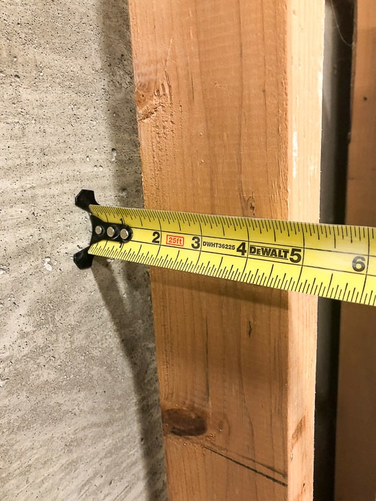 measuring depth from studs to cement wall