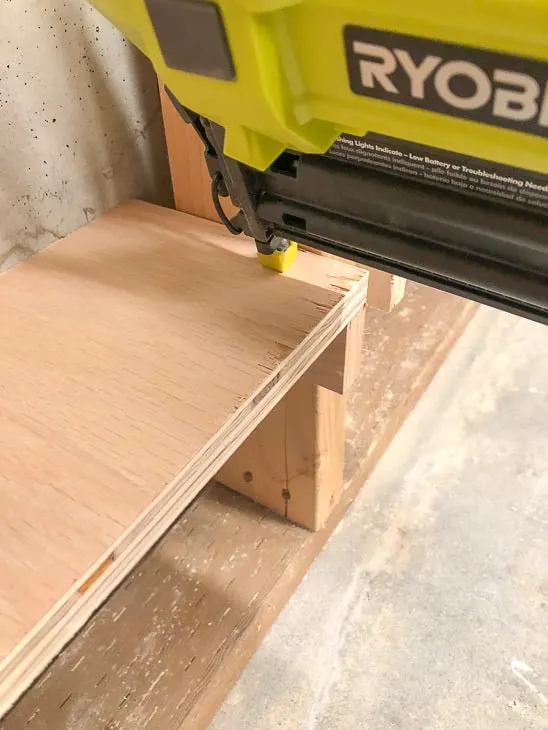nailing shelf to top of shelf brackets