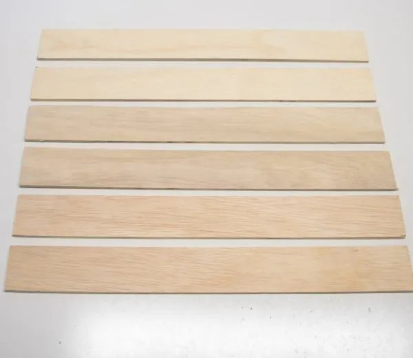 cut slats of ¼" plywood for DIY martial arts belt display