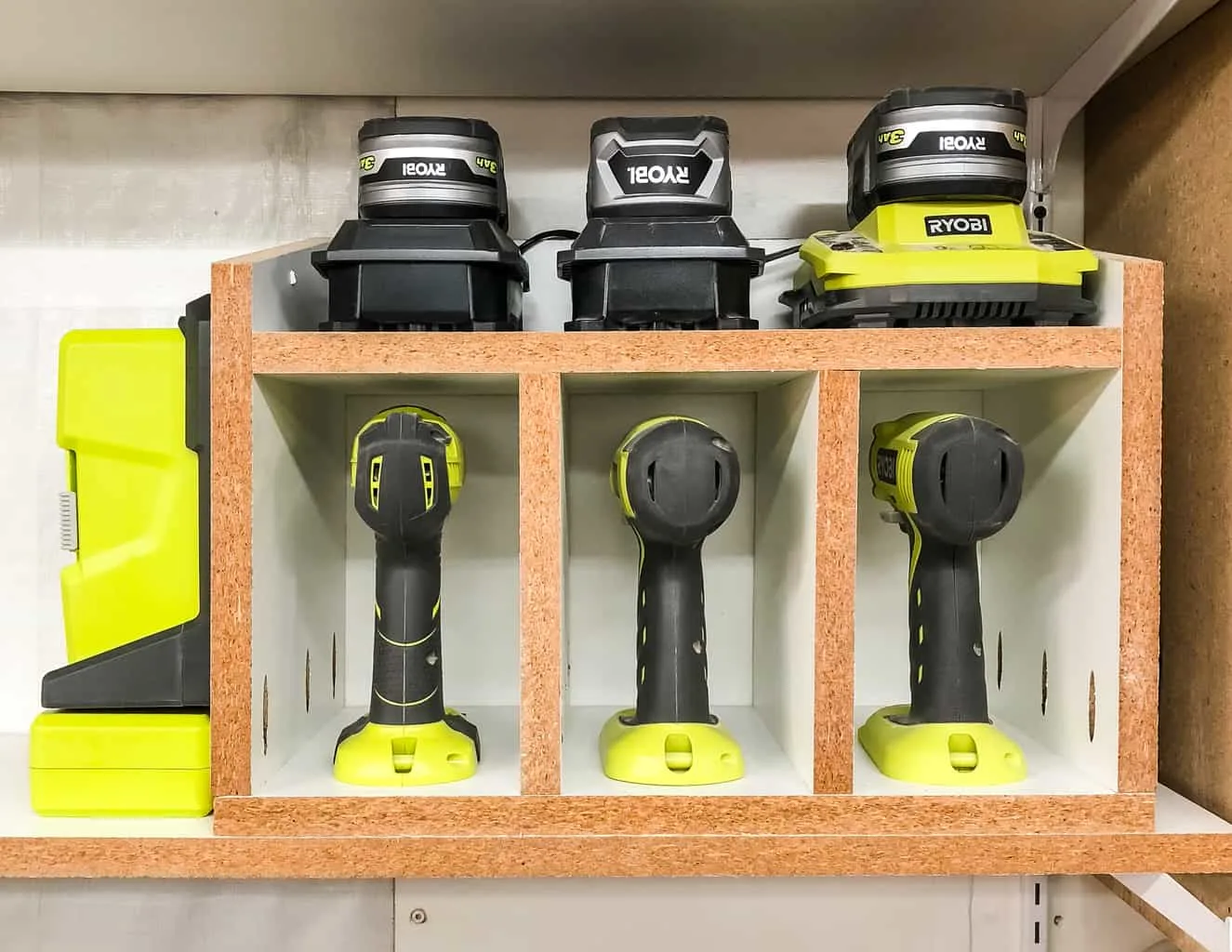 DIY cordless drill storage rack with charger shelf and bit storage