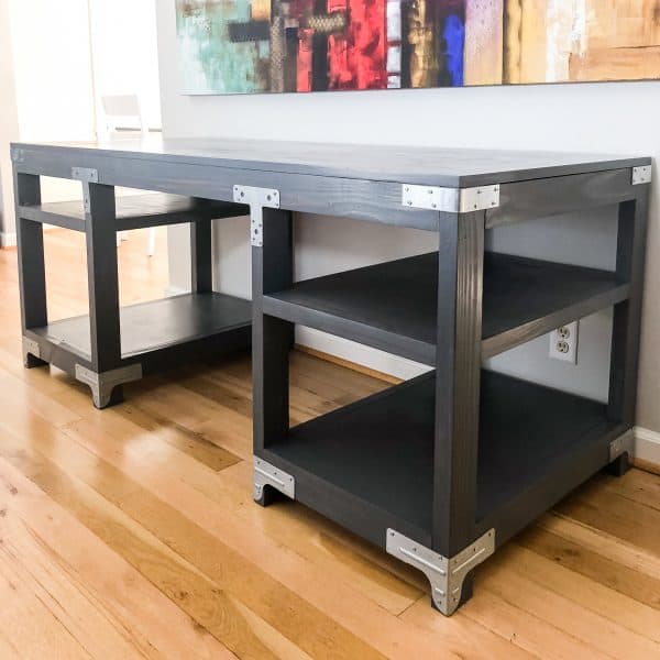 gray stained desk with metal accents
